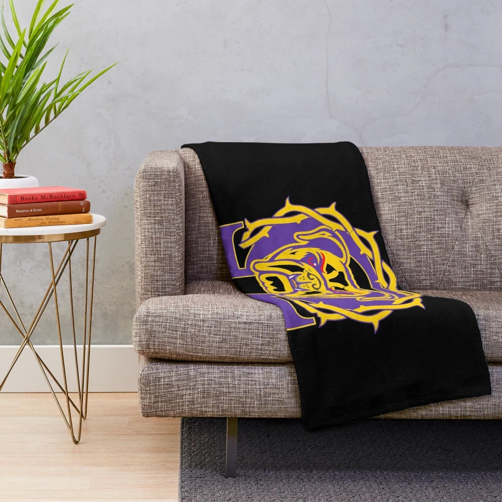 Omega Psi Phi fraternity plush blanket in purple and gold colors