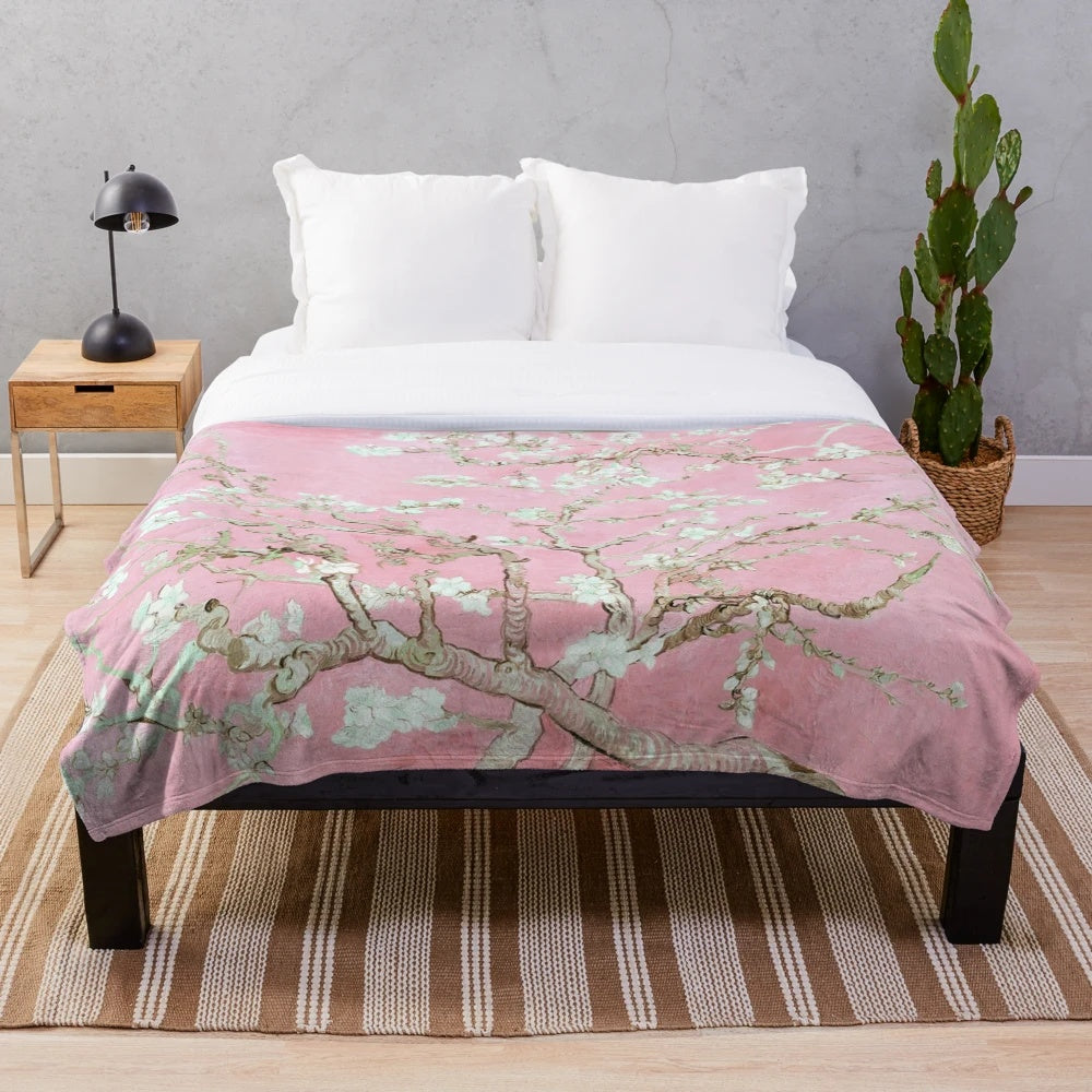 Pale pink plush blanket with floral design inspired by van Gogh's Almond Blossoms