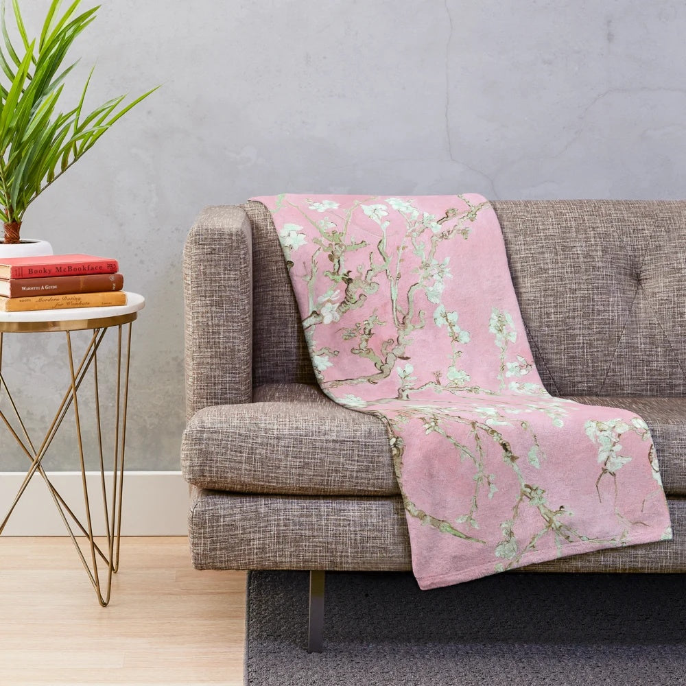 Pale pink plush blanket with floral design inspired by van Gogh's Almond Blossoms