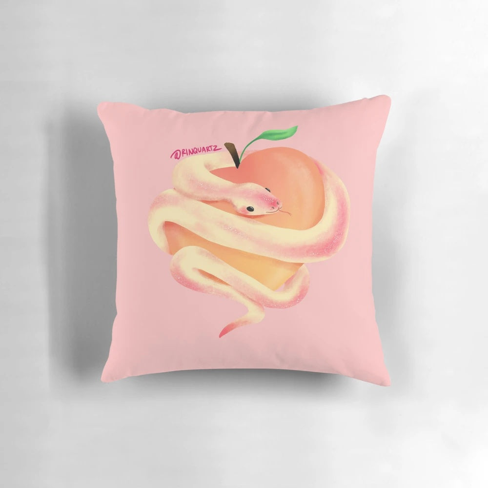 Peach snake-shaped plush pillow with a cute and whimsical design, perfect for decorative and comfort use.