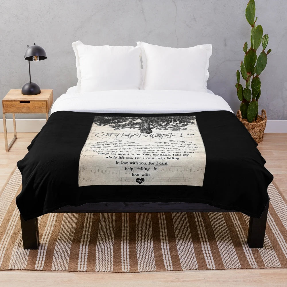 Soft and cozy plush blanket featuring the lyrics to Elvis Presley's "Can't Help Falling In Love