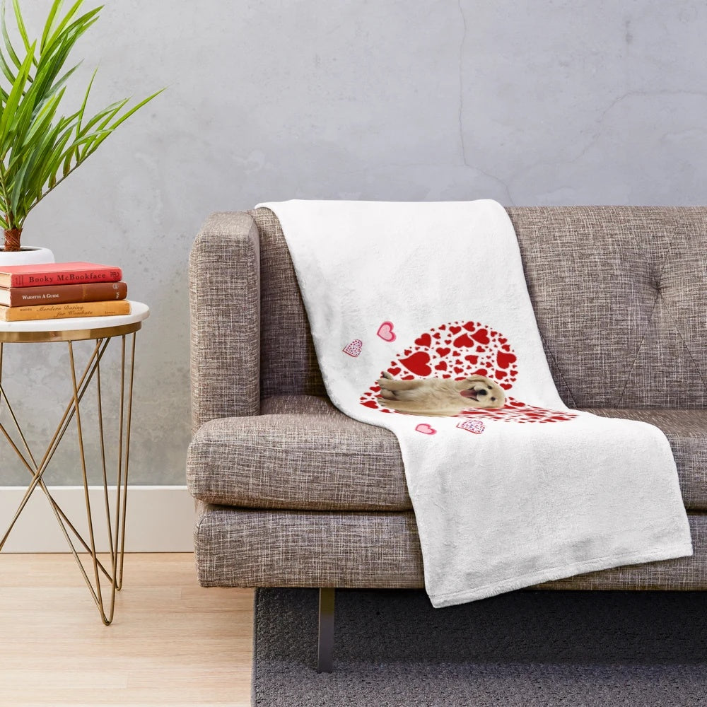 Soft and cuddly plush blanket featuring a puppy love design