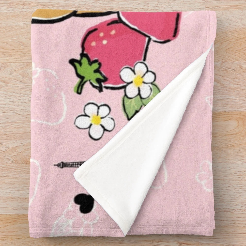 Rilakkuma-inspired plush blanket with a cute strawberry design