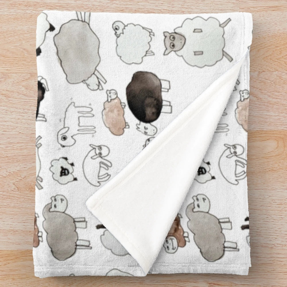 Soft and plush sheep-themed blanket for comfortable home decor