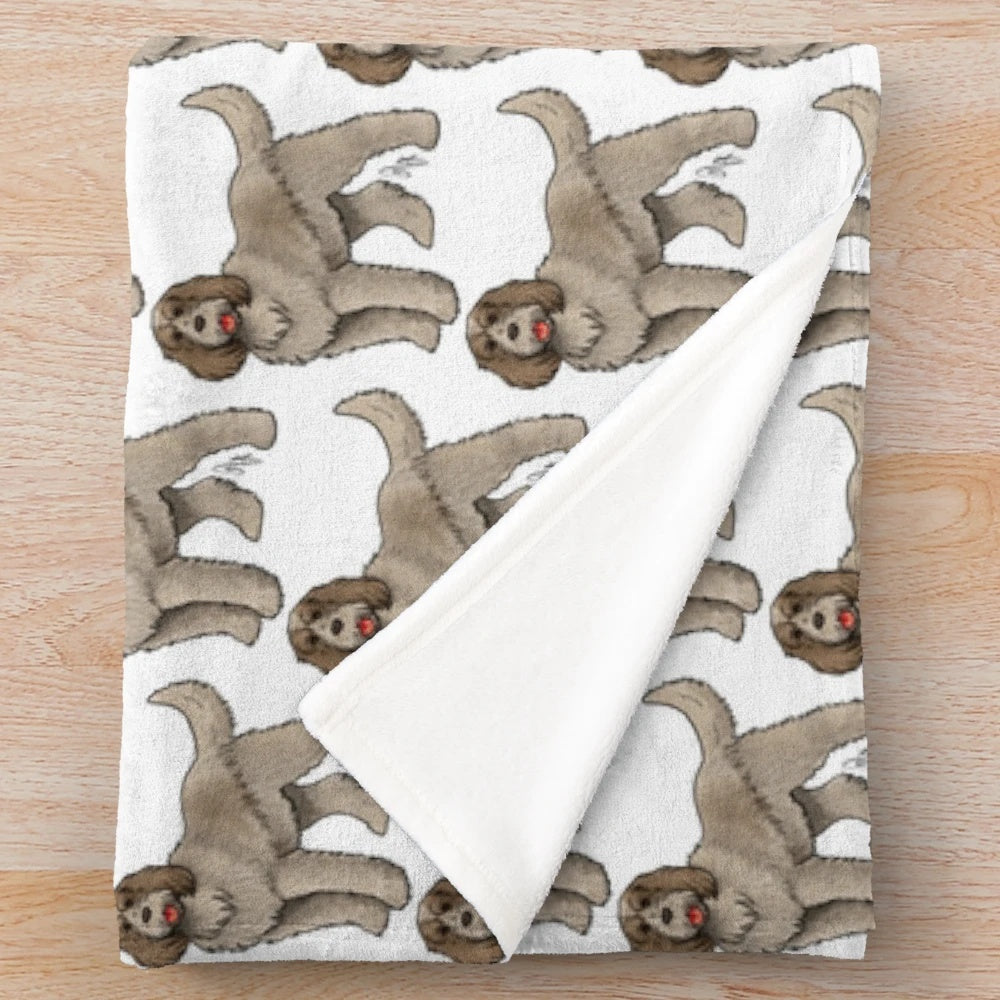 A brown roan Spinone Italiano dog breed puppy on a plush blanket