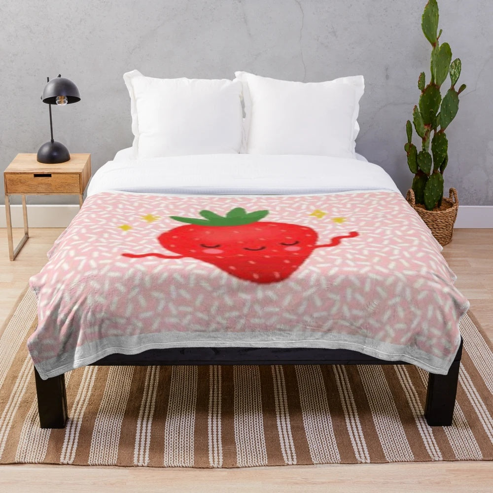 Soft and plush strawberry-patterned blanket