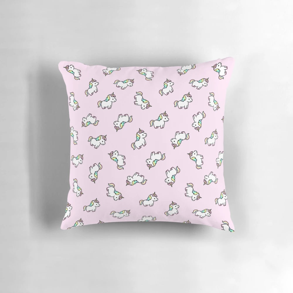 Soft and plush unicorn pillow in pastel rainbow colors, perfect for children's bedroom decor.