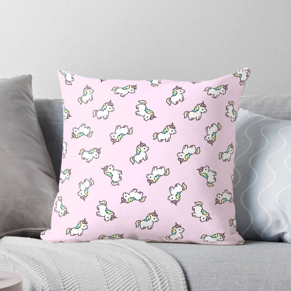 Soft and plush unicorn pillow in pastel rainbow colors, perfect for children's bedroom decor.