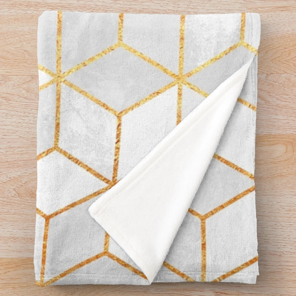 White plush blanket with abstract geometric pattern