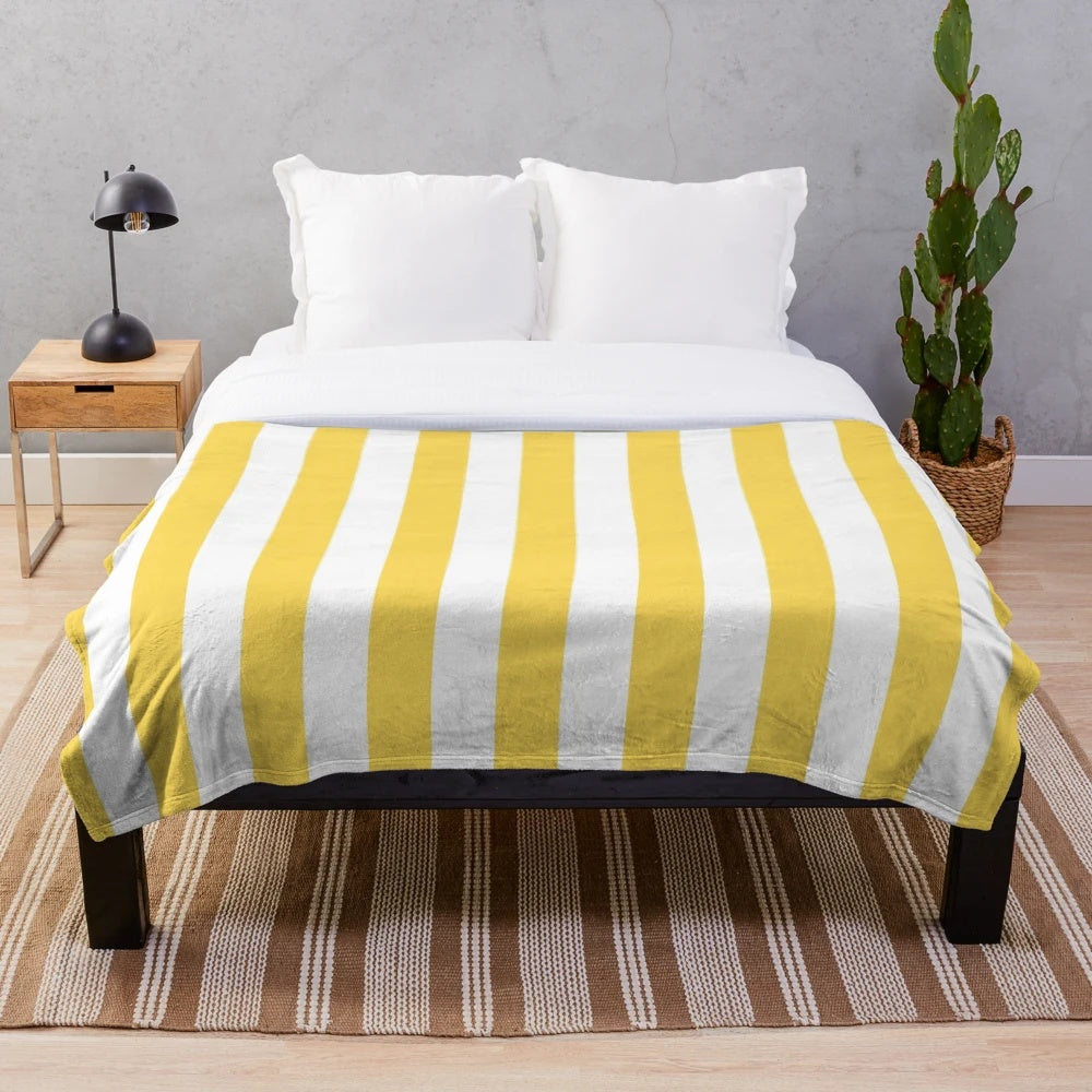 Yellow and white vertical striped plush blanket