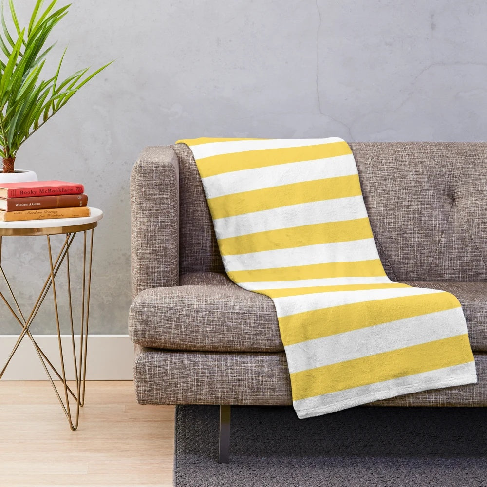 Yellow and white vertical striped plush blanket
