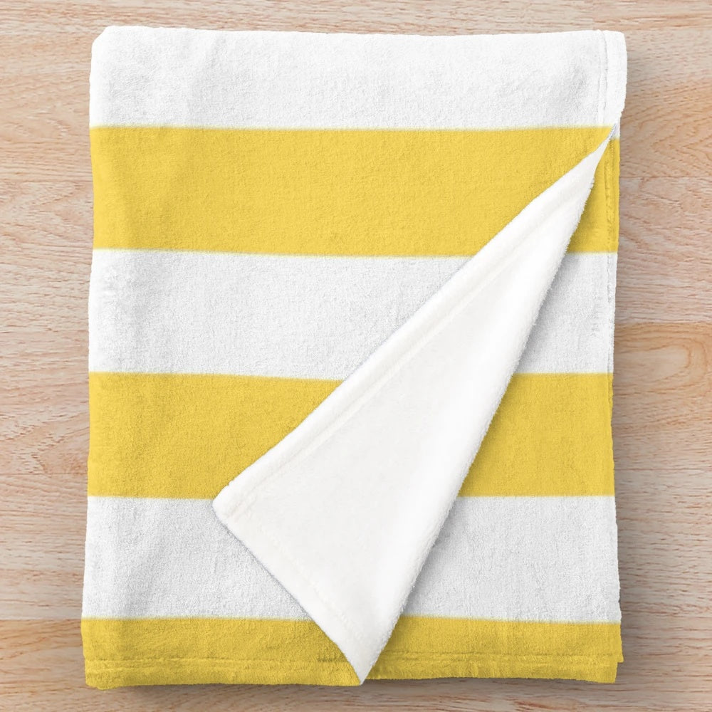 Yellow and white vertical striped plush blanket