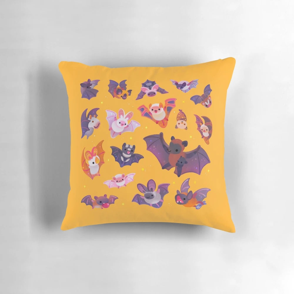 A yellow bat-shaped pillow with a cute and whimsical design, perfect for adding spooky charm to your home.
