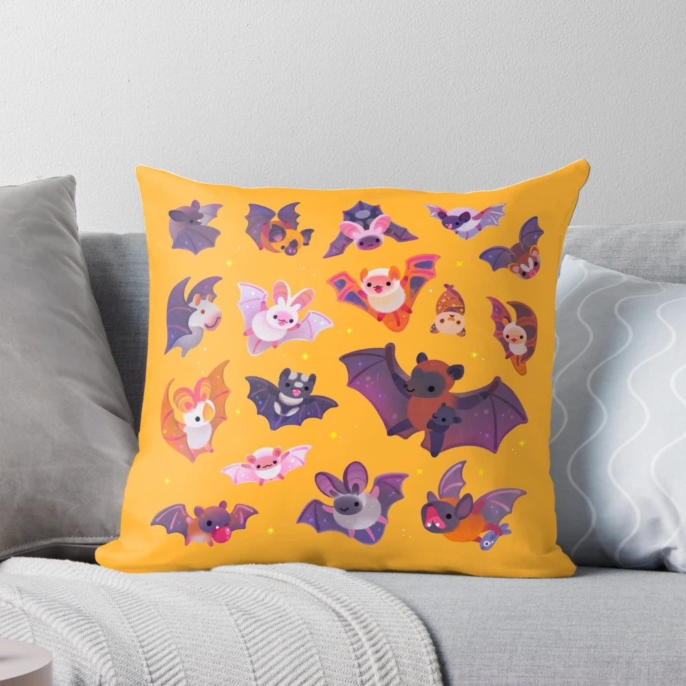 A yellow bat-shaped pillow with a cute and whimsical design, perfect for adding spooky charm to your home.