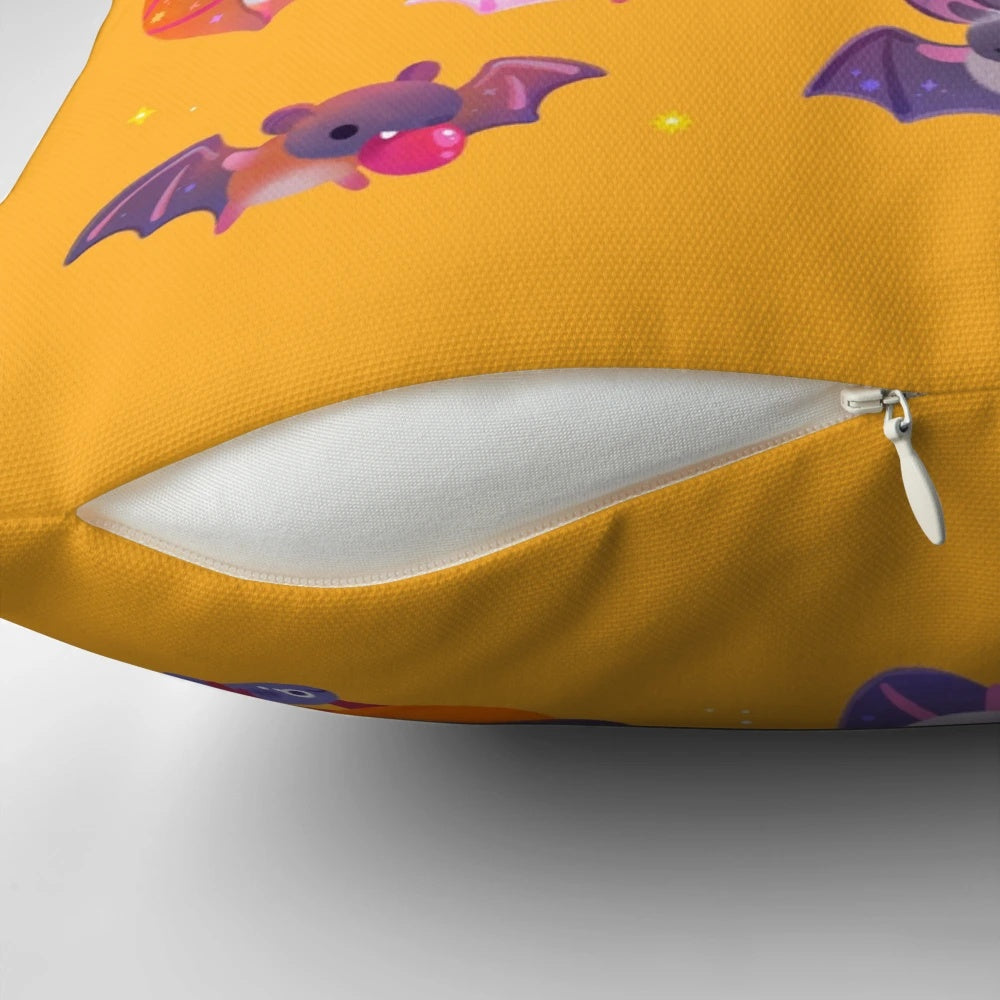 A yellow bat-shaped pillow with a cute and whimsical design, perfect for adding spooky charm to your home.