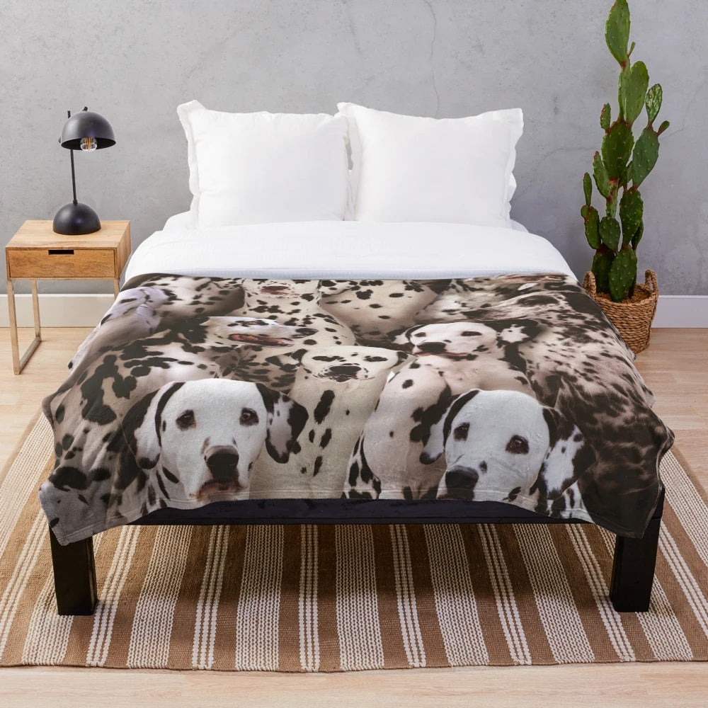 Dalmatian-inspired plush blanket with black and white spotted dog design