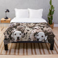 Dalmatian-inspired plush blanket with black and white spotted dog design