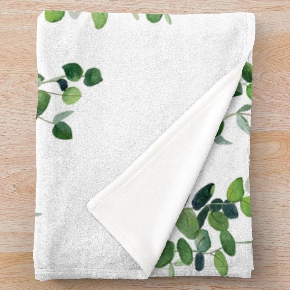 Soft, plush eucalyptus garland patterned blanket