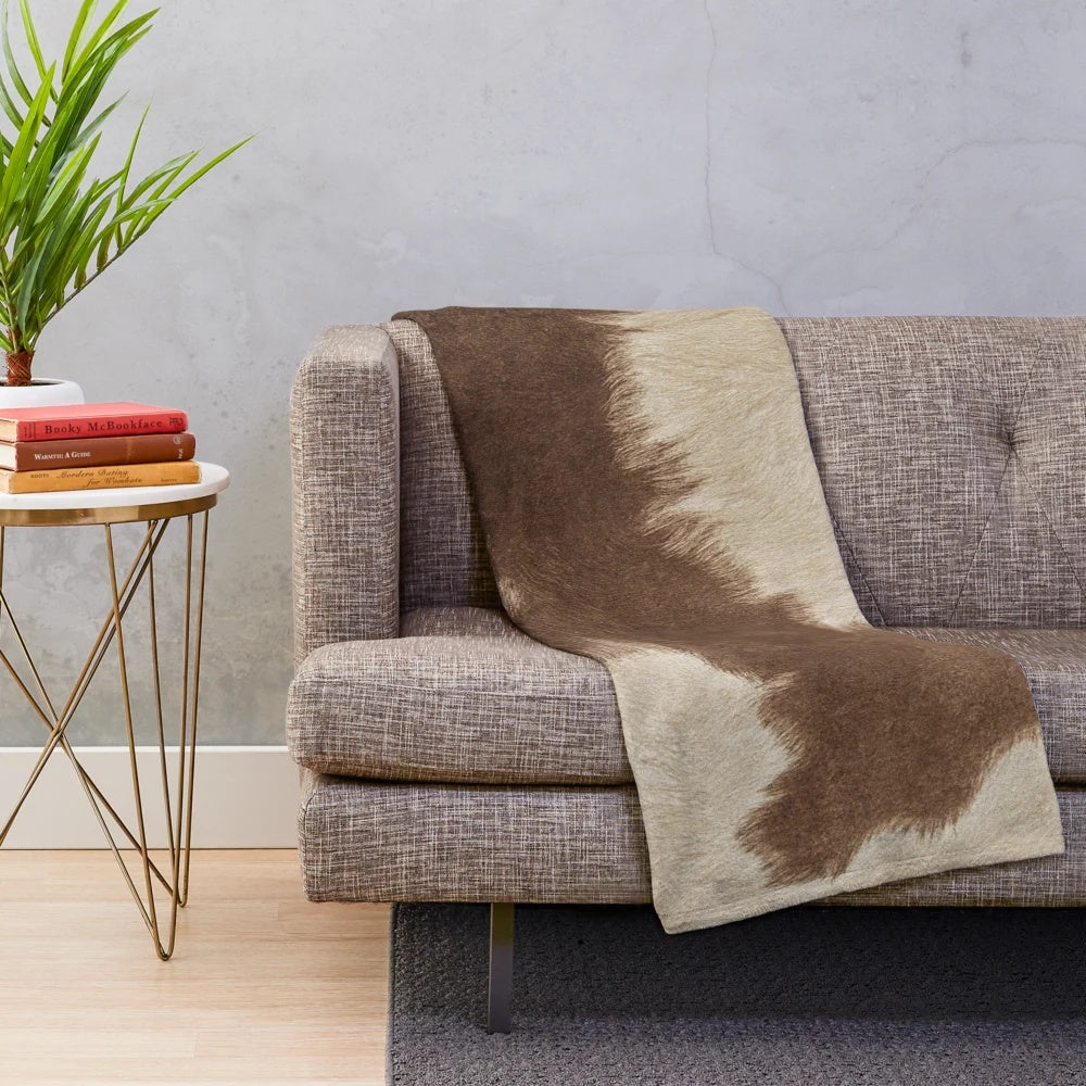 Faux brown cowhide plush blanket