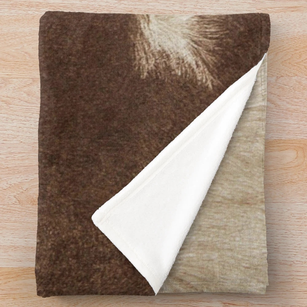 Faux brown cowhide plush blanket