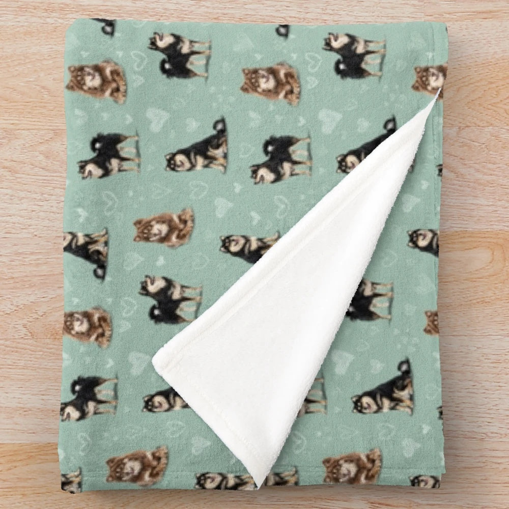 Soft and cozy fleece blanket featuring a Finnish Lapphund dog design