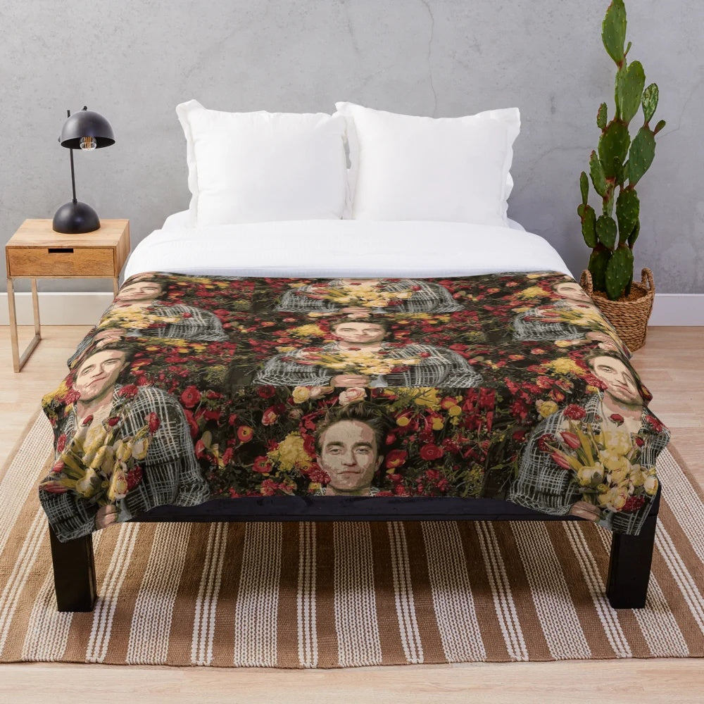 Soft and cozy floral plush blanket featuring Robert Pattinson design