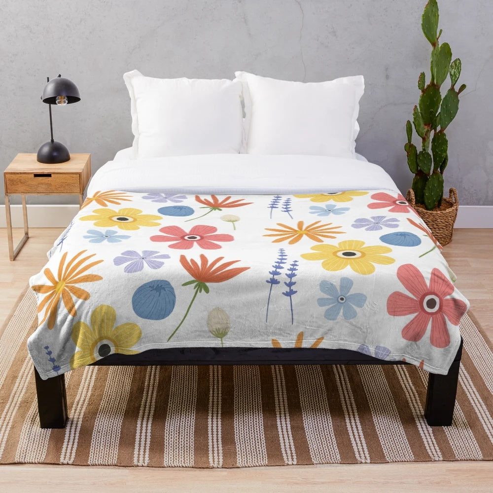 Soft and cozy plush blanket with a vibrant floral print design