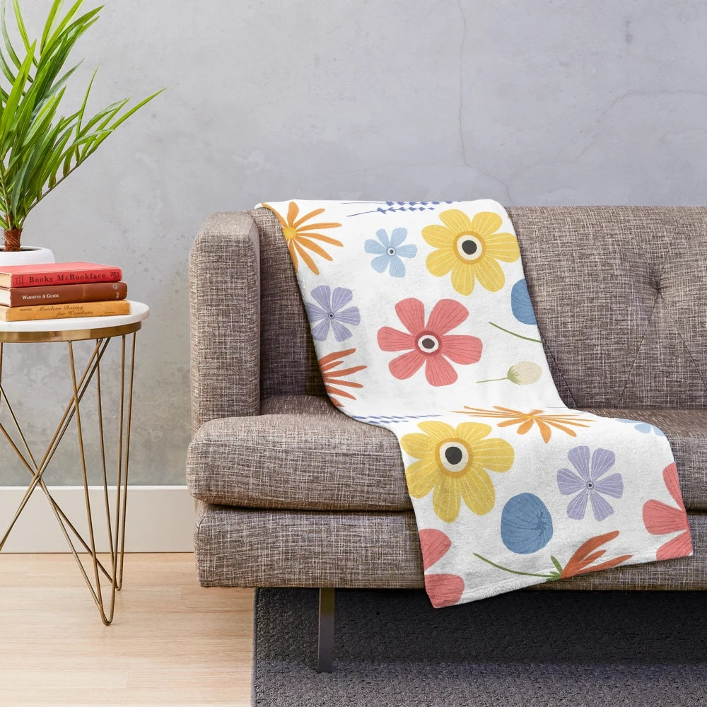 Soft and cozy plush blanket with a vibrant floral print design
