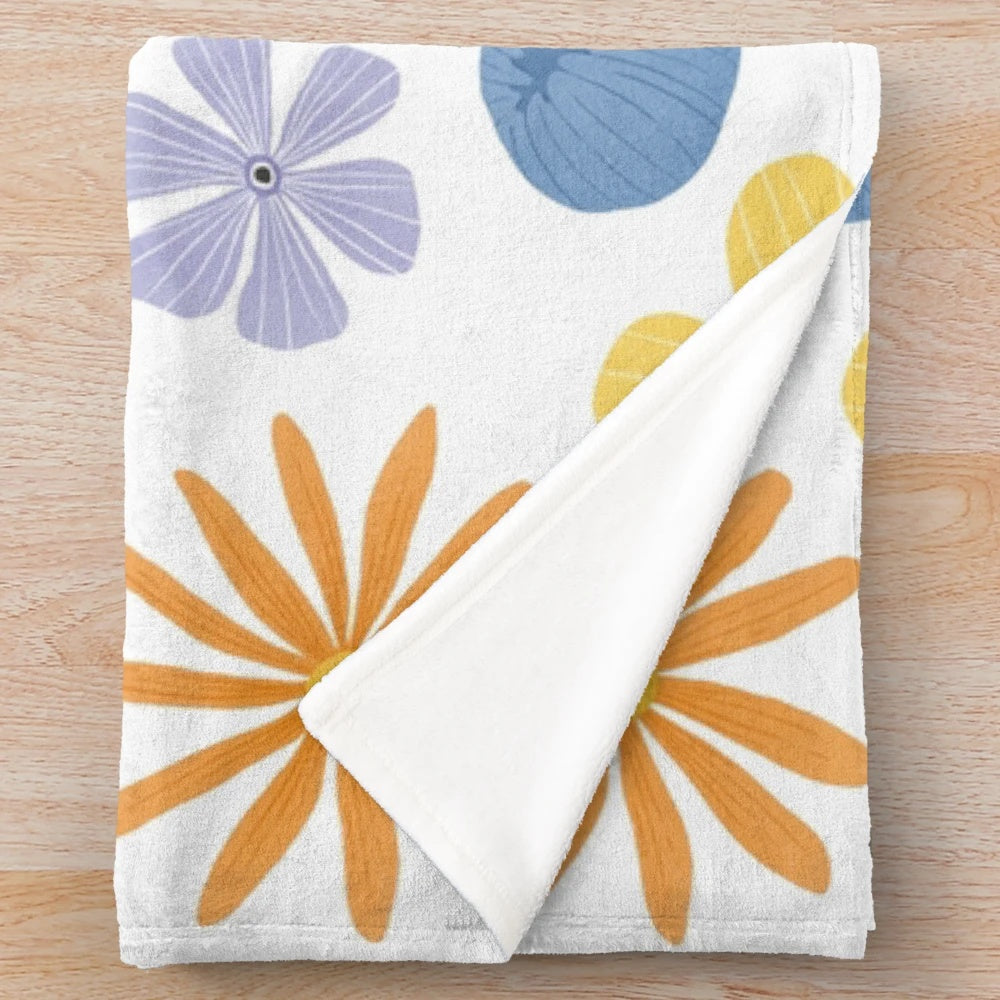 Soft and cozy plush blanket with a vibrant floral print design