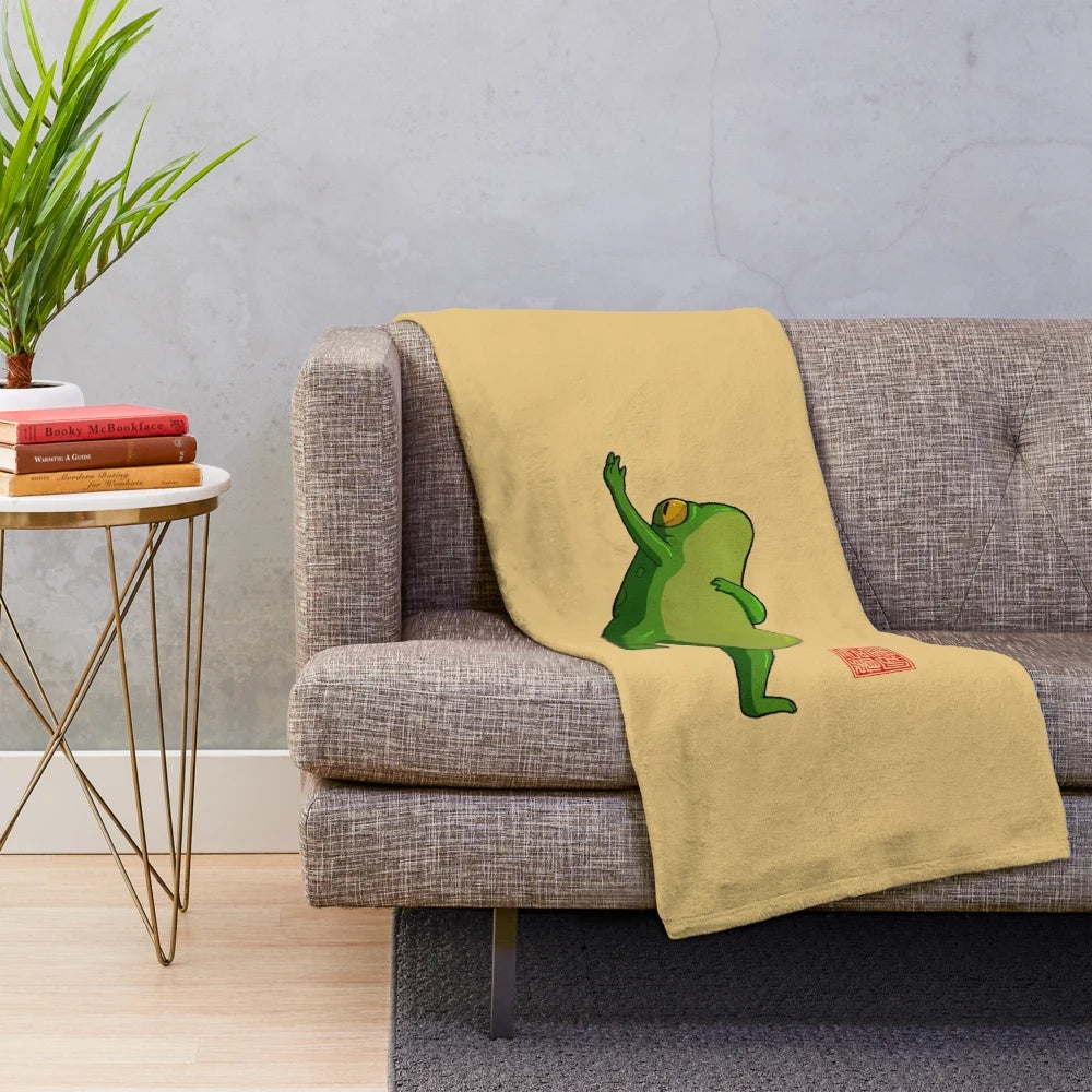 Soft and cozy plush blanket with a cute frog design, perfect for yoga, meditation, and relaxation.