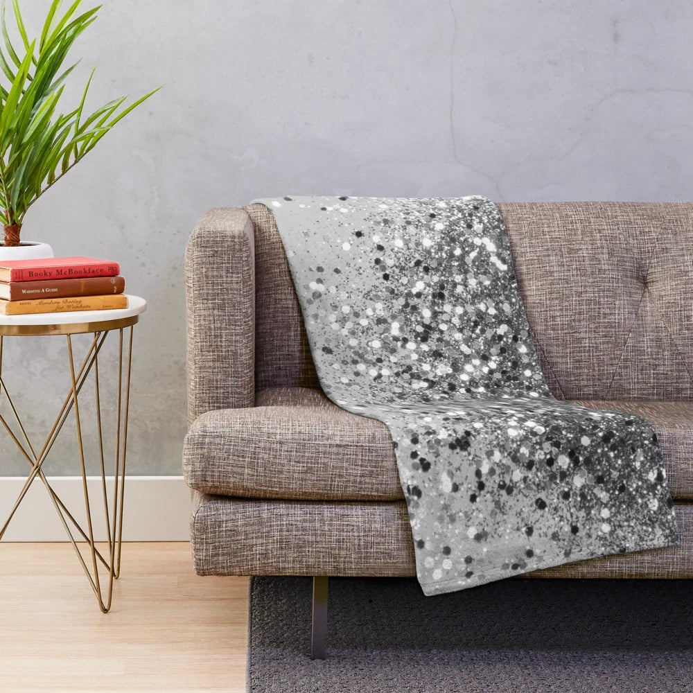 Soft gray plush blanket with shimmery glitter accents