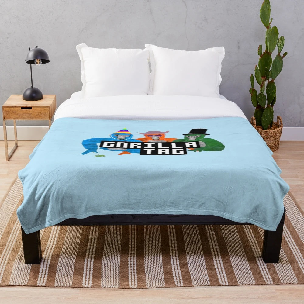 Soft and cozy plush blanket featuring the Gorilla Tag game logo and characters
