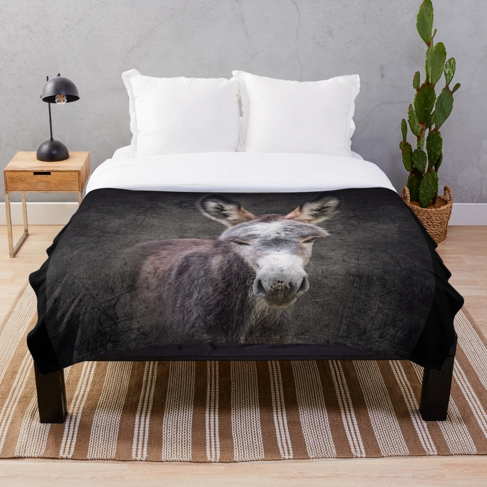 Soft gray plush blanket featuring a donkey foal