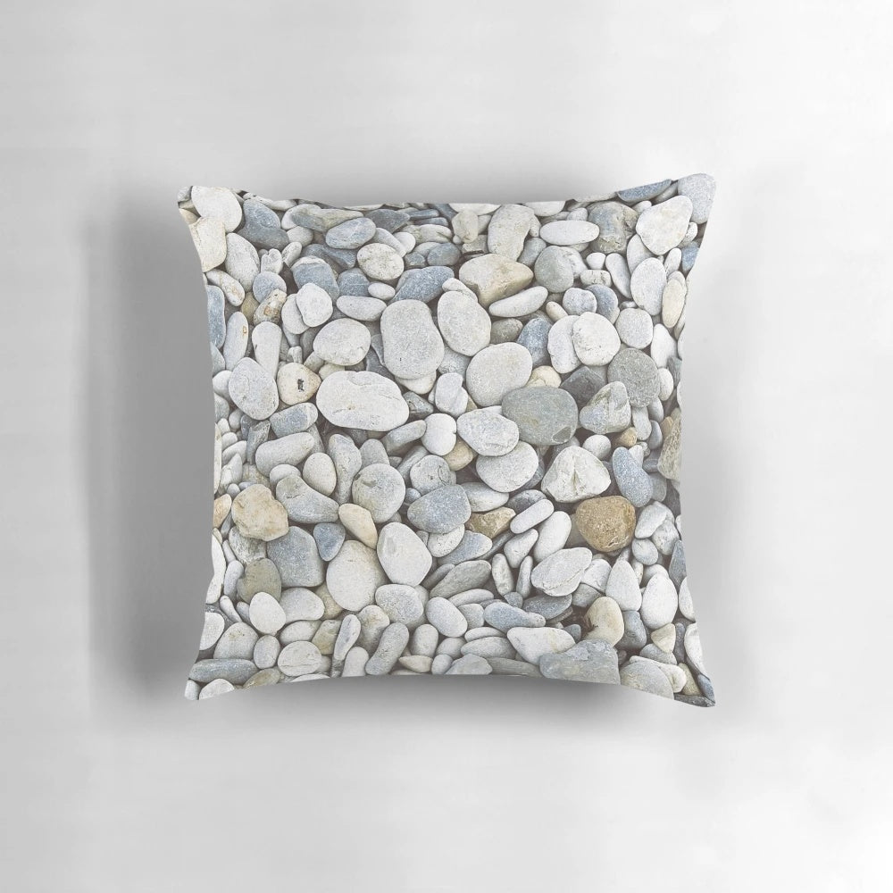 Grey pebbles decorative pillow with a natural, bumpy texture