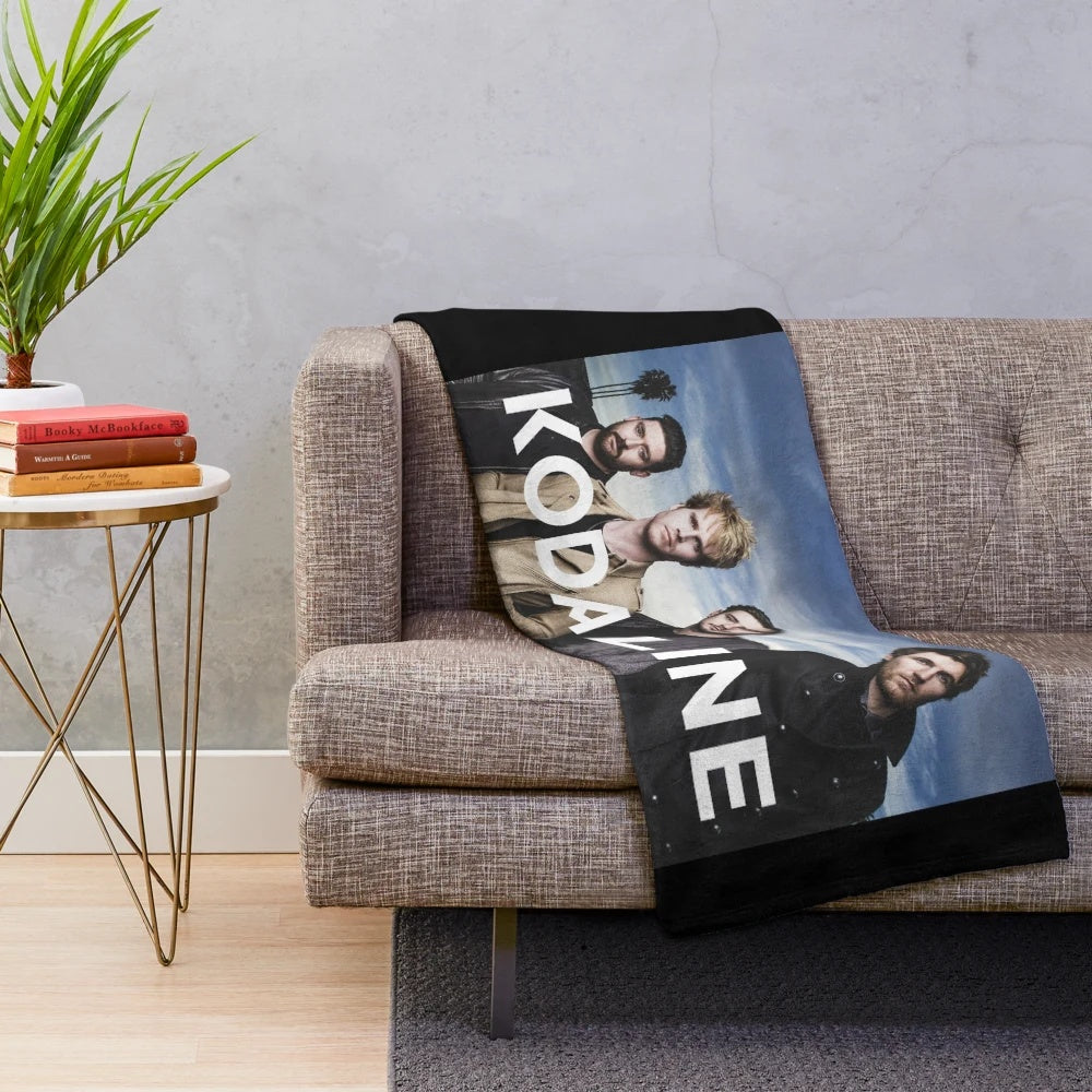 Soft and cozy plush blanket featuring the Kodaline band logo and name