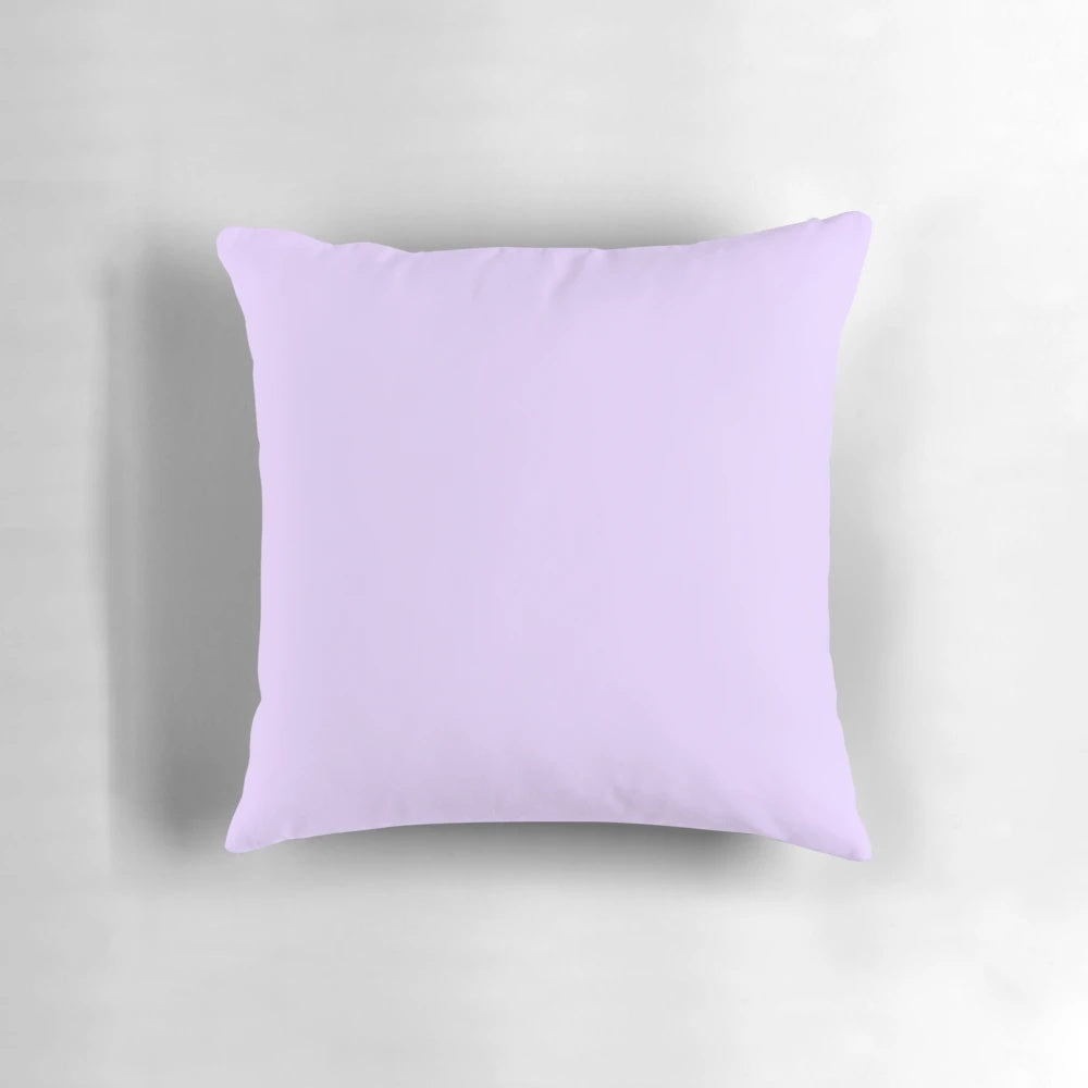 Pale lilac solid color pillow with a soft, plush texture for comfortable home decor.