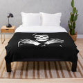 Misfits-inspired plush blanket with skull and band logo design