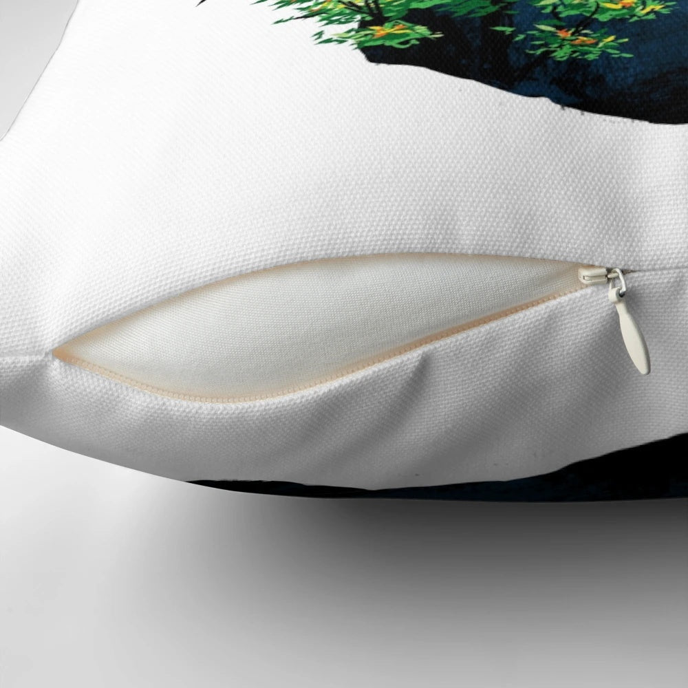 A soft, decorative pillow featuring a nature-inspired design with a bear hugging a tree surrounded by birds and a colorful landscape.