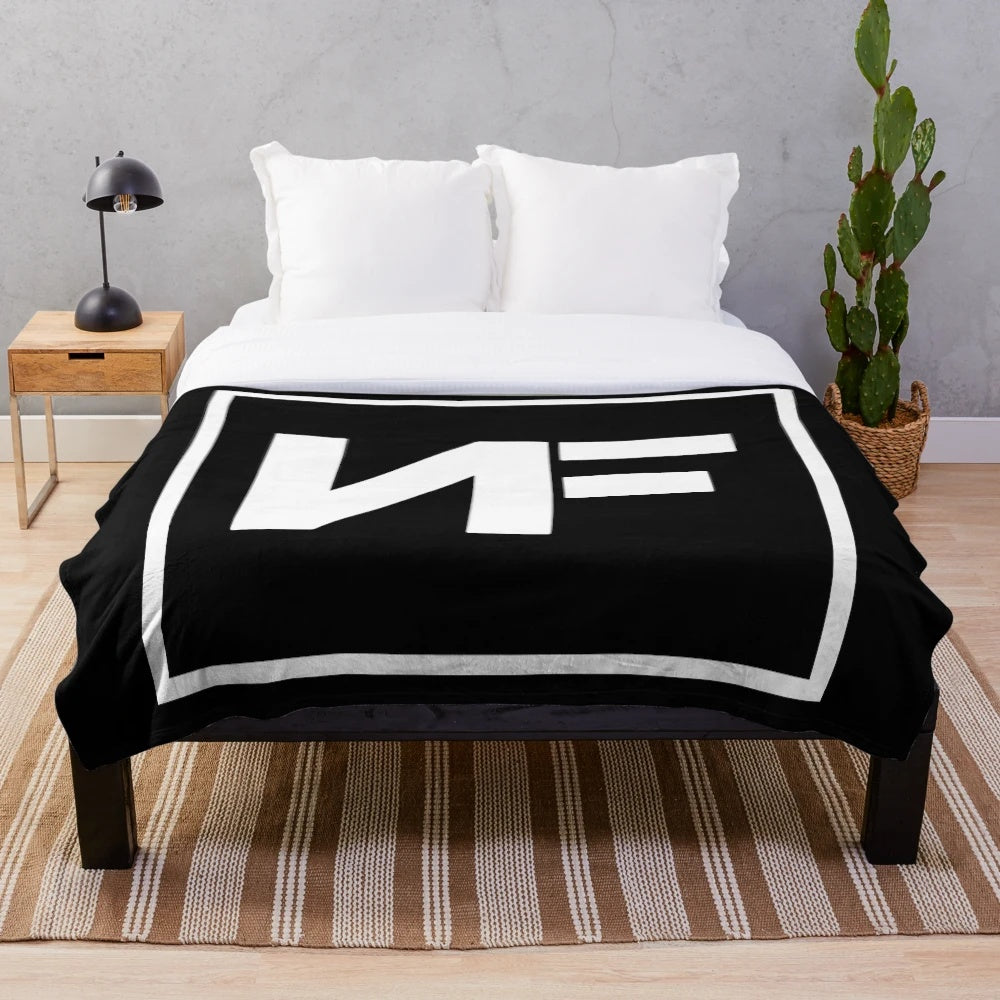 Soft and cozy NF logo plush blanket