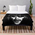 Soft and cozy plush blanket featuring a portrait of comedian Noel Fielding
