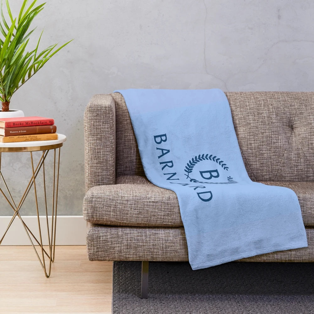 Soft baby blue plush blanket with Barnard College logo