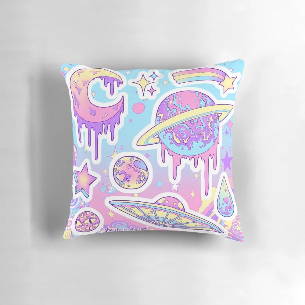Soft, pastel-colored decorative throw pillow with a galaxy, planet, and stars design