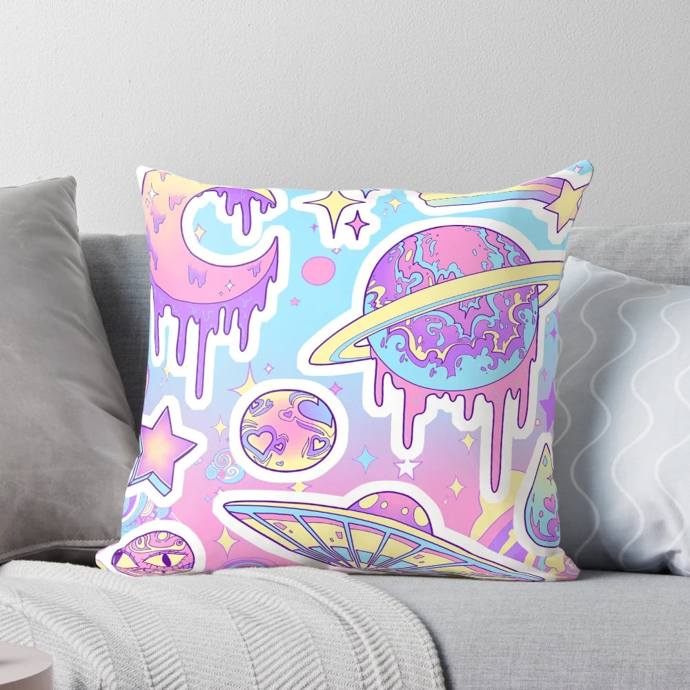 Soft, pastel-colored decorative throw pillow with a galaxy, planet, and stars design