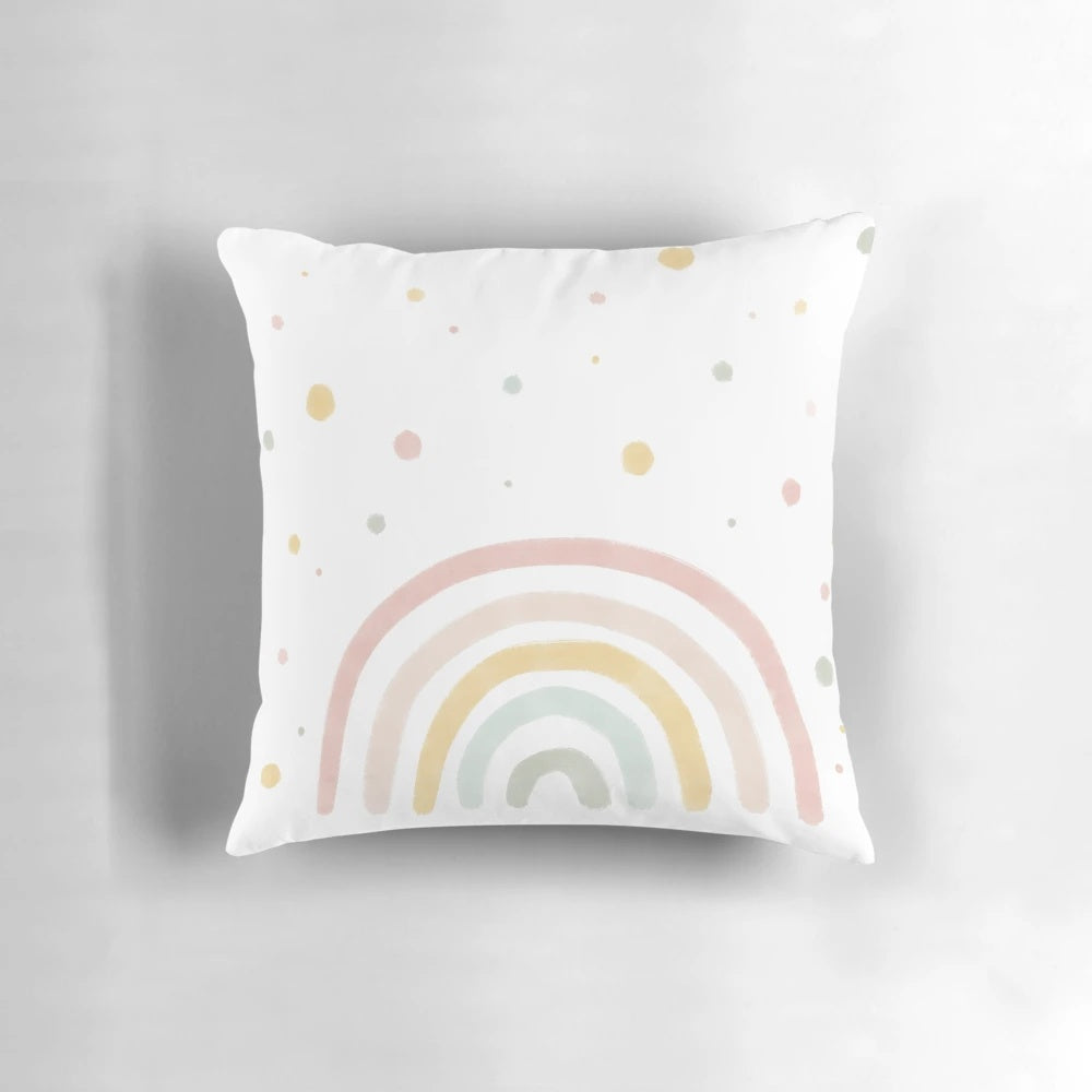 Soft, pastel-colored rainbow pillow for infants and babies