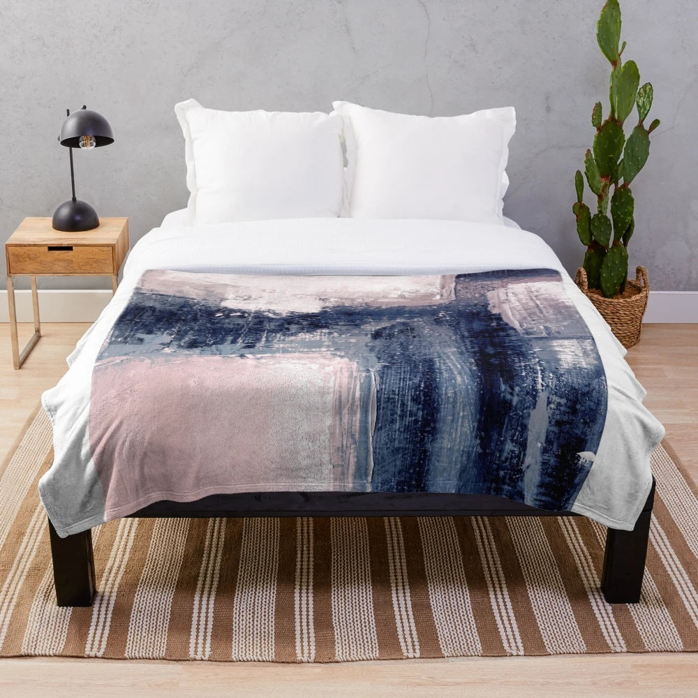 Pink and navy plush blanket with modern abstract art pattern