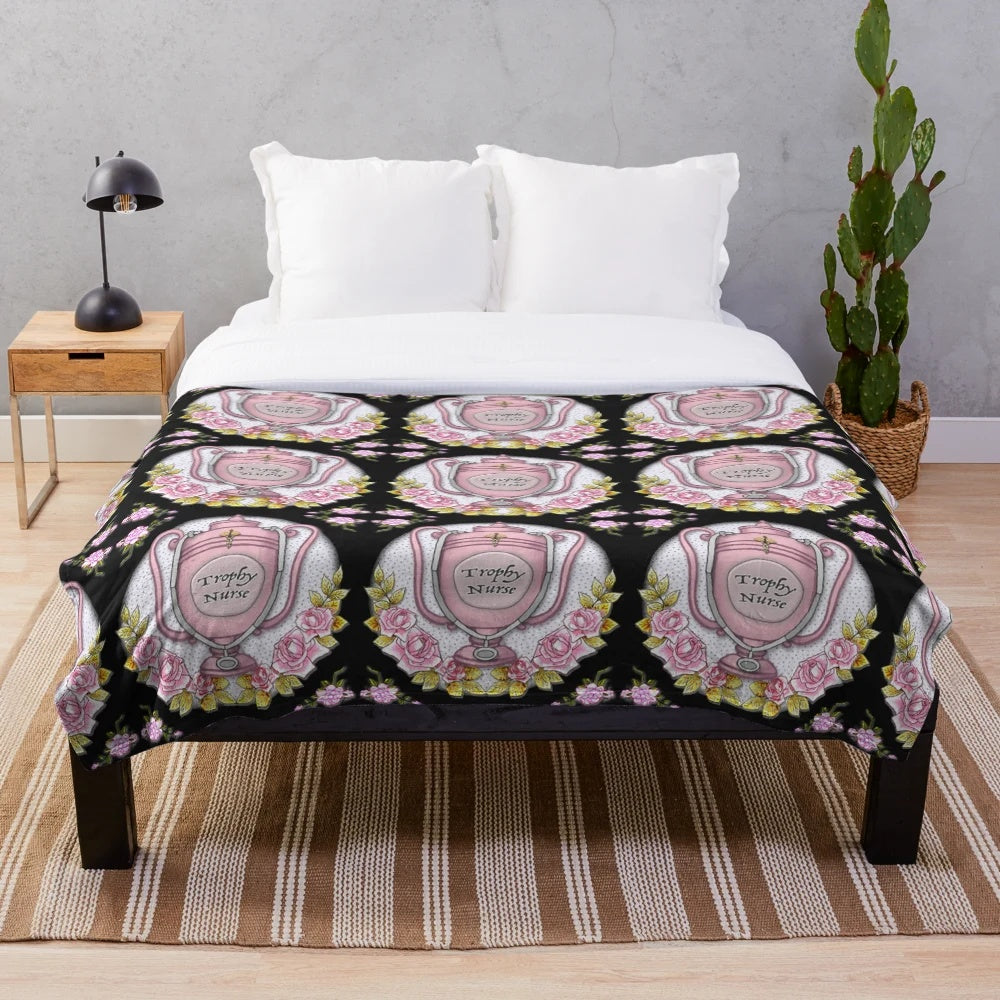 Soft pink plush blanket with trophy nurse graphic