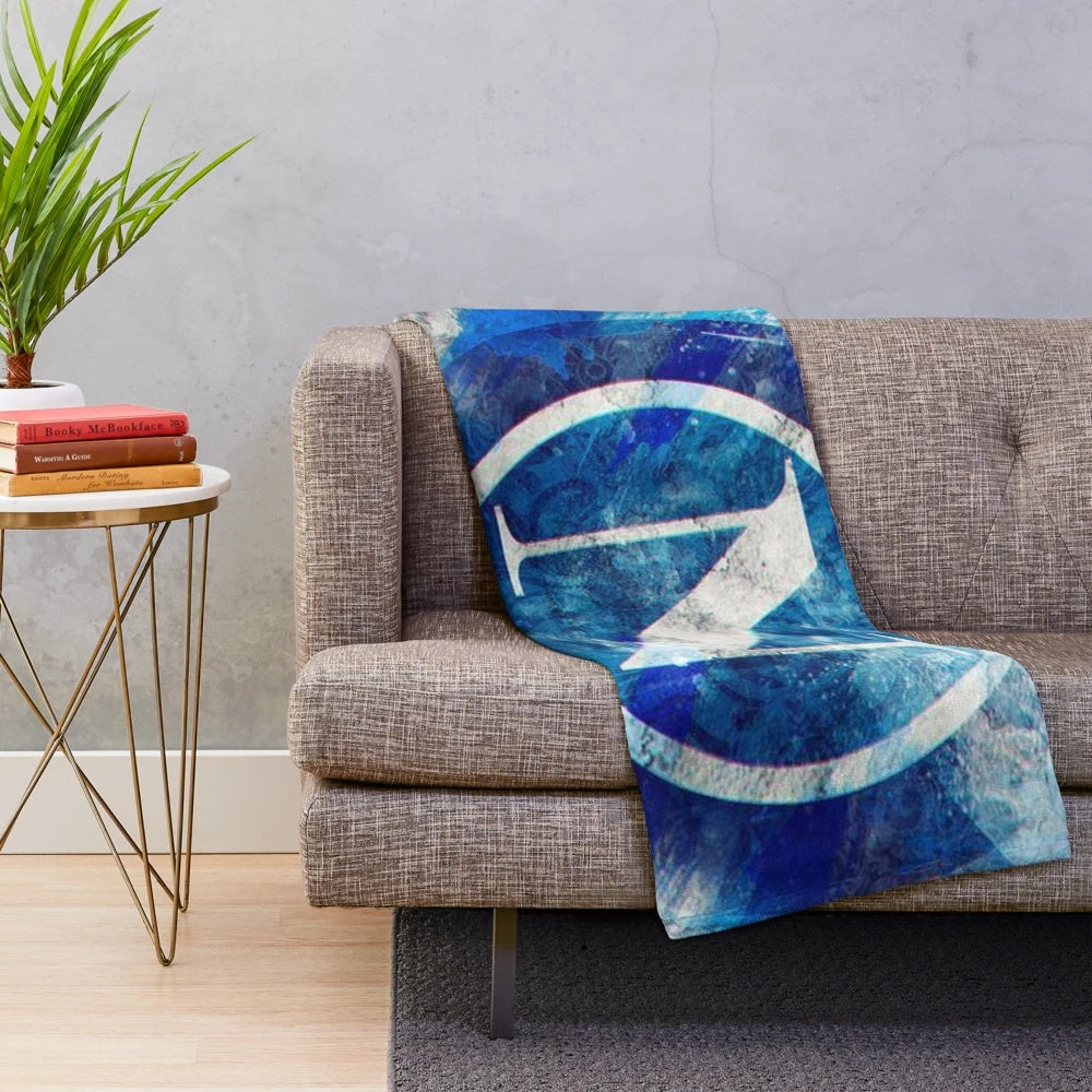 Plush blanket featuring the logo and colors of S.S.C. Napoli football club
