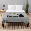 Plush blanket with skeet and clay shooting design