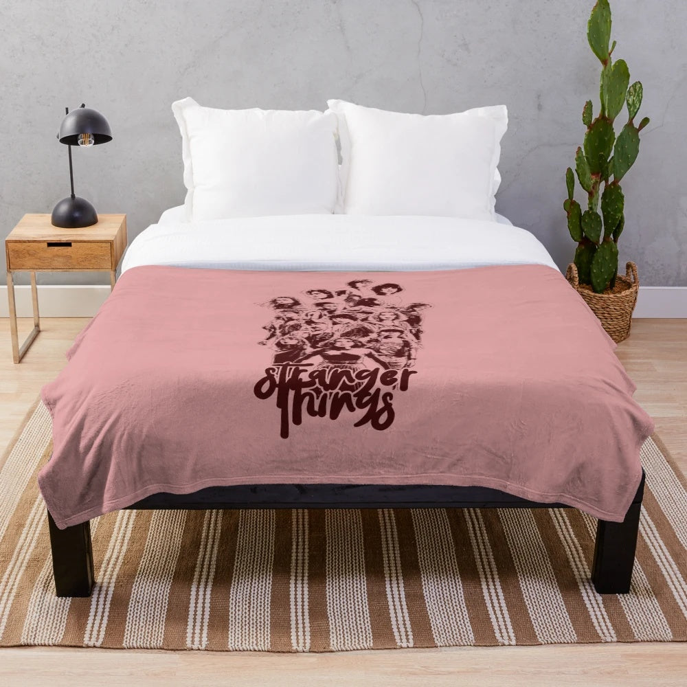 Soft and cozy plush blanket featuring Stranger Things design