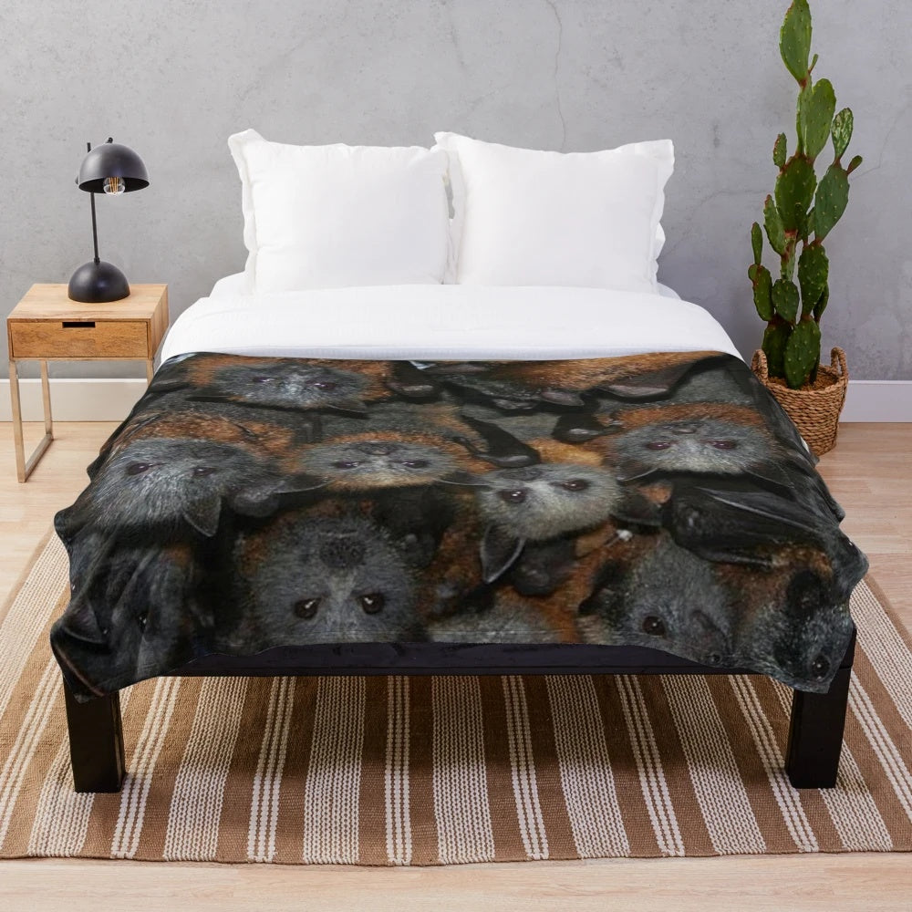 Soft plush blanket featuring adorable grey headed flying fox bats